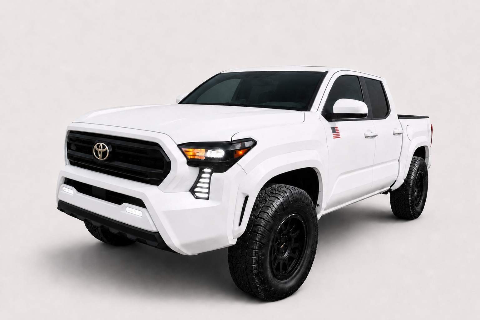 White Toyota Tacoma in factory trim
