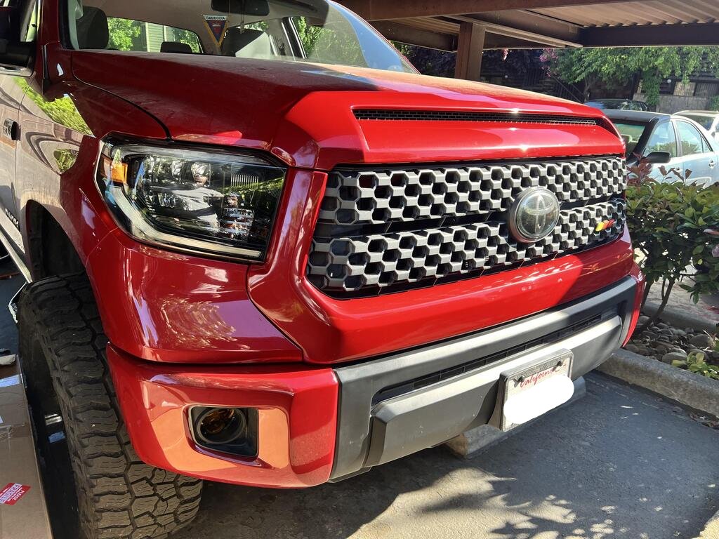 Fully Installed Hood Bulge and Grille Surround Kit in Barcelona Red on a 2014-2021 Toyota Tundra, full black out kit
