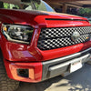 Fully Installed Hood Bulge and Grille Surround Kit in Barcelona Red on a 2014-2021 Toyota Tundra, full black out kit