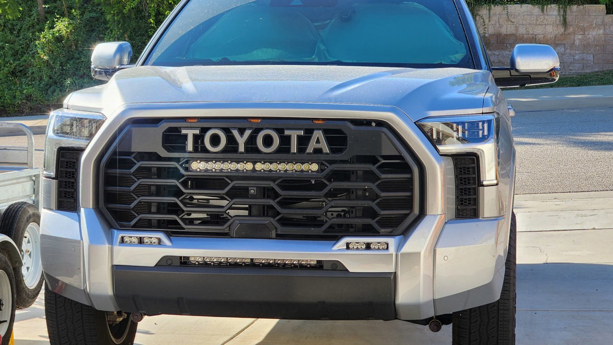 customer's Celestial Silver 3rd generation toyota tundra with Shellz installed on the grille 