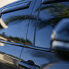 palm trees reflecting in the background of a Toyota Tundra sporting Shellz Window Trim kit