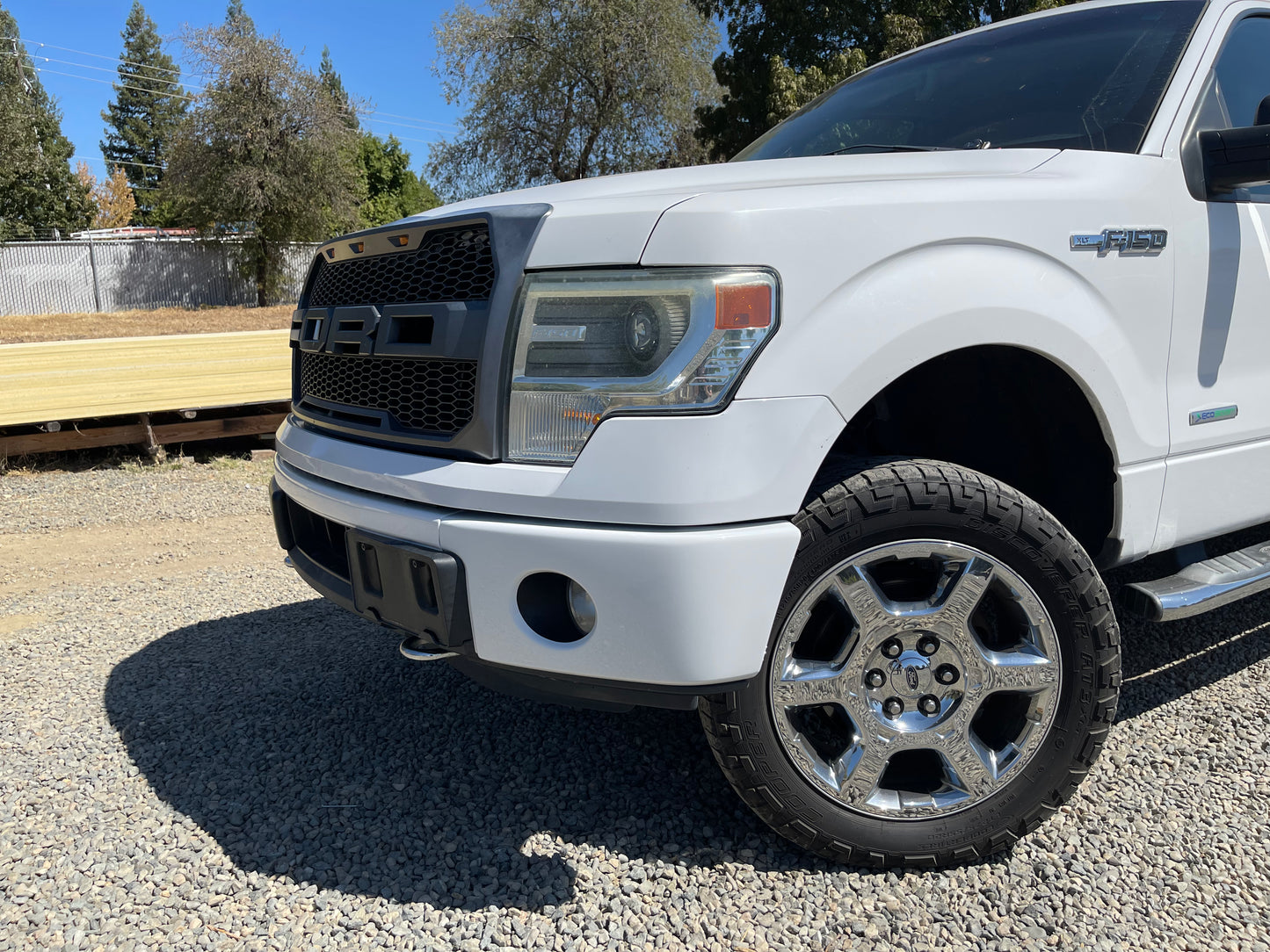 Gloss White Front BumperShellz installed on a 2009-2014 Ford F150, for chrome delete