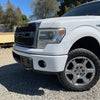 Gloss White Front BumperShellz installed on a 2009-2014 Ford F150, for chrome delete