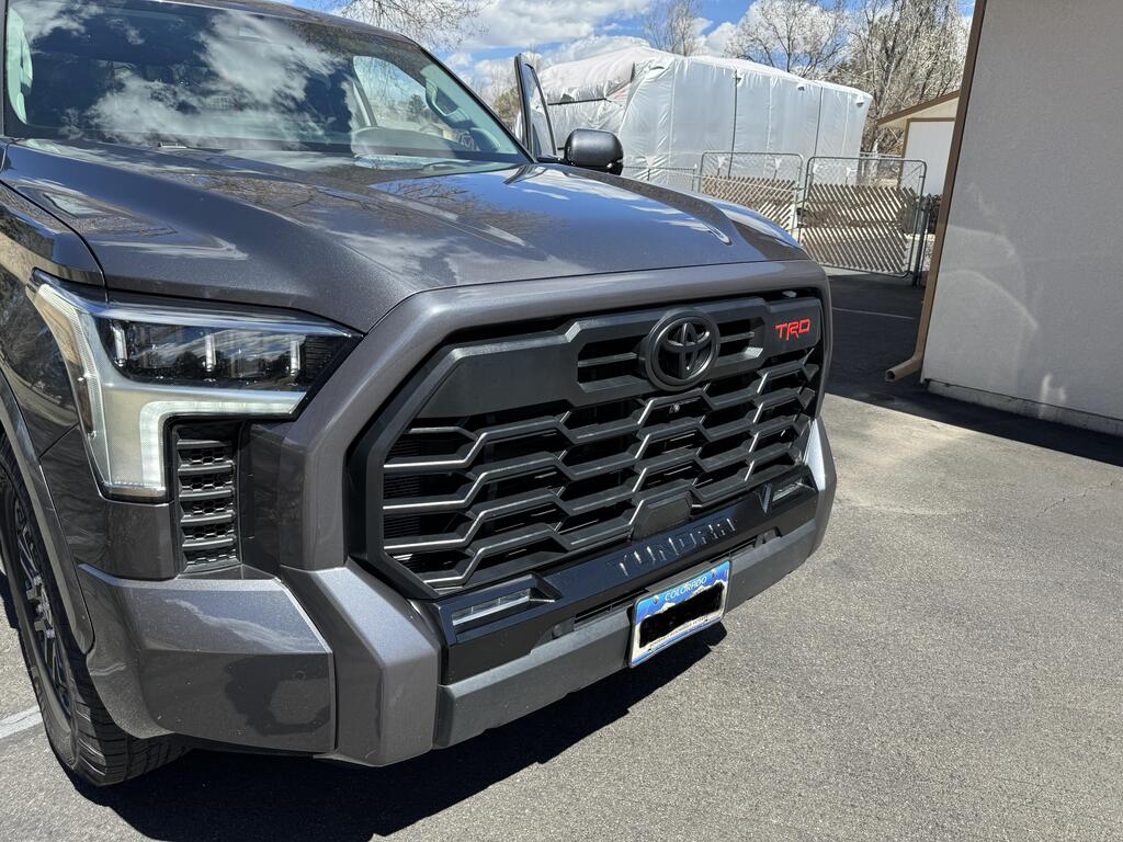 2022-2024 Toyota Tundra with Magnetic Gray Metallic Grille Surround overlay fully installed
