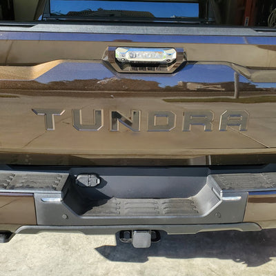 2022 -2024 Toyota Tundra rear bumper with BumperShellz installed in smoked mesquite, showcasing the finished look.