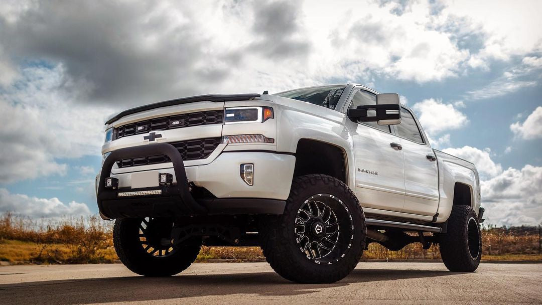 2016-2018 Chevy Silverado 1500 - Front BUMPERSHELLZ™ installed on a gloss white truck
