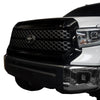Front and side view at a 45-degree angle of a Toyota Tundra, showcasing Gloss Black BumperShellz overlays on the grille surround and hood bulge