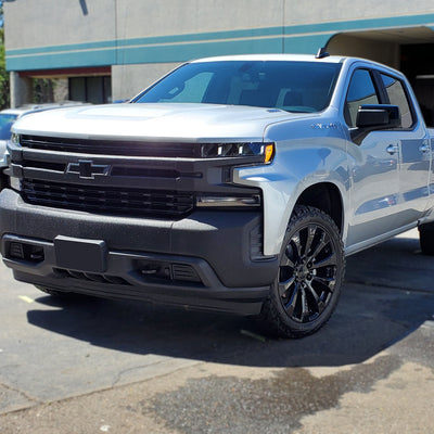 White 2019-2020 Silverado 1500 LT/LTZ equipped with an armor-coated Grille Overlay, demonstrating the rugged and tough visual appeal