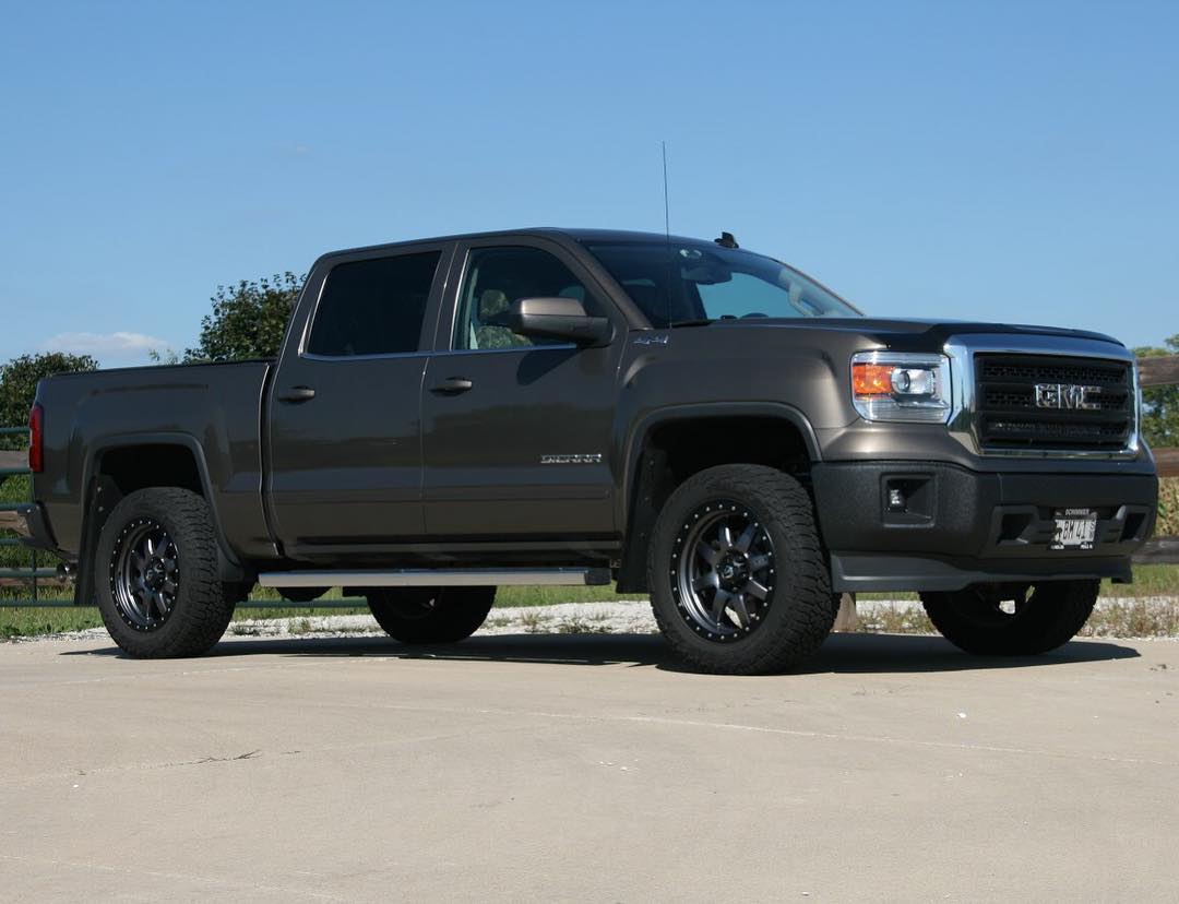 Front end bumper covers Bedlined Shellz installed on a 2014-2015 GMC Sierra to show off the rugged look 