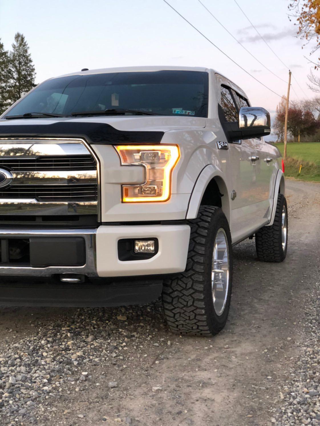  45 degree angle of 2015-2017 F-150 Front BumperShellz fully installed on the driver side, chrome delete kit