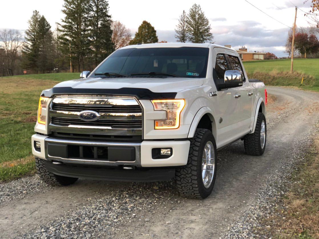 Gloss White Side caps installed on a 2015-2017 F-150 Front BumperShellz, foglamp cut-out Chrome Delete Kit