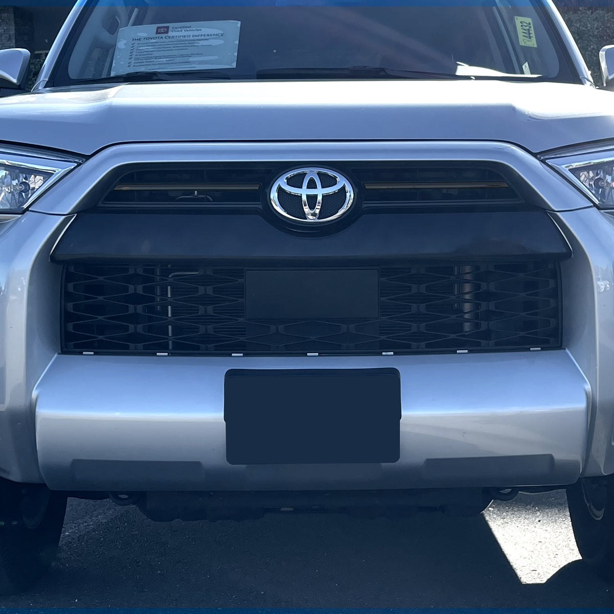 Fully installed black out kit, showcasing the Gloss Black Upper Grille Garnish on a 2014-2022 4Runner SR5, highlighting the enhanced aesthetic.