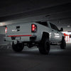 Olympic White Rear Bumper Covers installed on a 2014-2018 Chevy Silverado, showing off it's sleek design