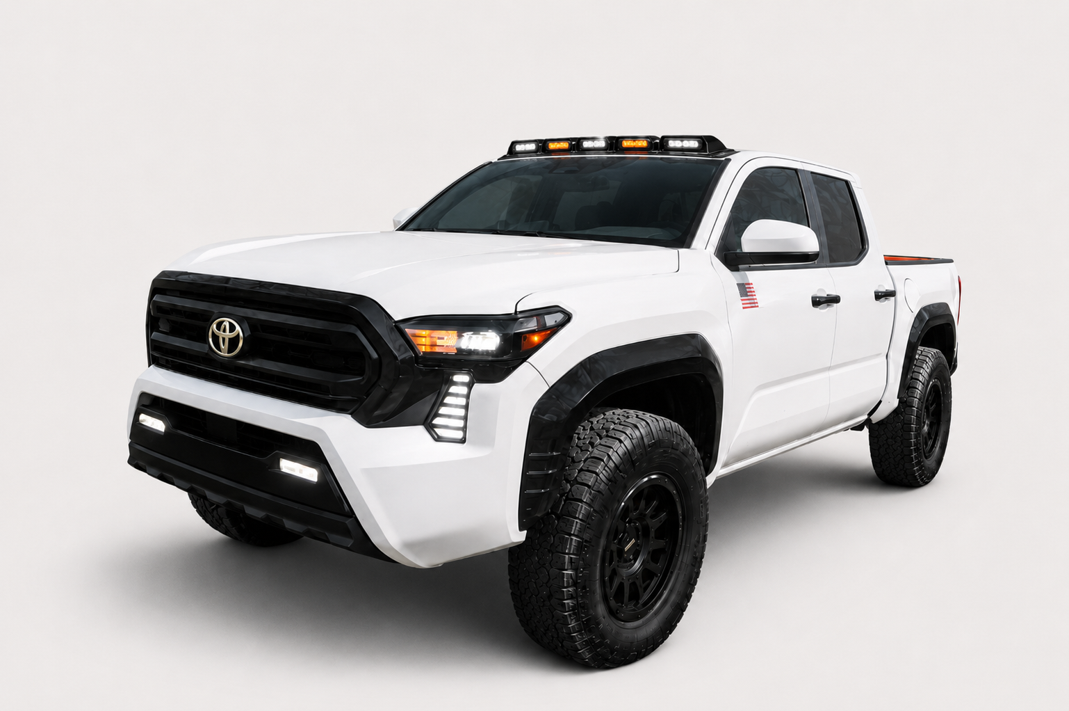 White Toyota Tacoma with a coordinated exterior trim package